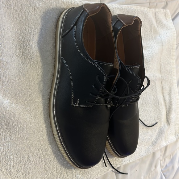 Never worn. I can only wear a 12 wide, this pair is a 12 medium. - Picture 2 of 4